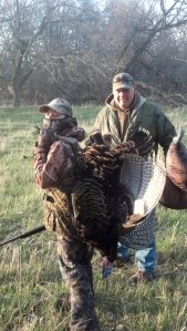 Brigham gets the task of hauling his Dad's big bird. Our gracious host, Sterling Monroe stands beside him.